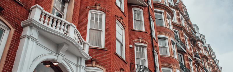 Image of red brick city apartments for blog post titled 'How to Improve your EPC rating: The Landlord’s Guide'